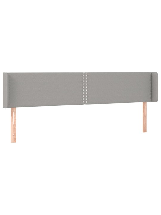 Čelo postele typu ušák světle šedé 203x16x78/88 cm textil