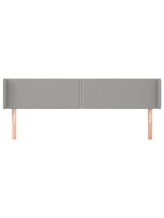 Čelo postele typu ušák světle šedé 203x16x78/88 cm textil