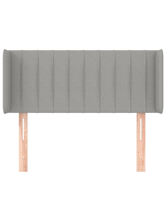 Čelo postele typu ušák světle šedé 103x16x78/88 cm textil