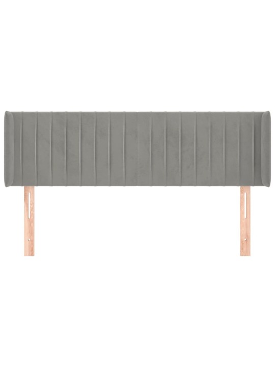 Čelo postele typu ušák světle šedé 147x16x78/88 cm samet