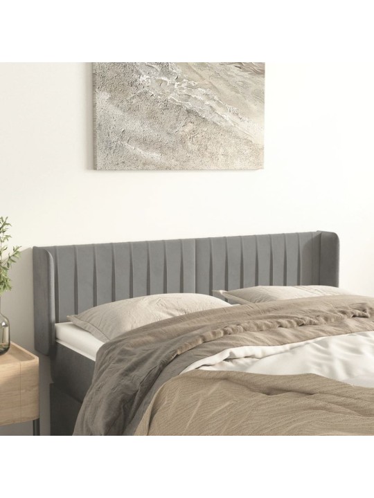 Čelo postele typu ušák světle šedé 147x16x78/88 cm samet