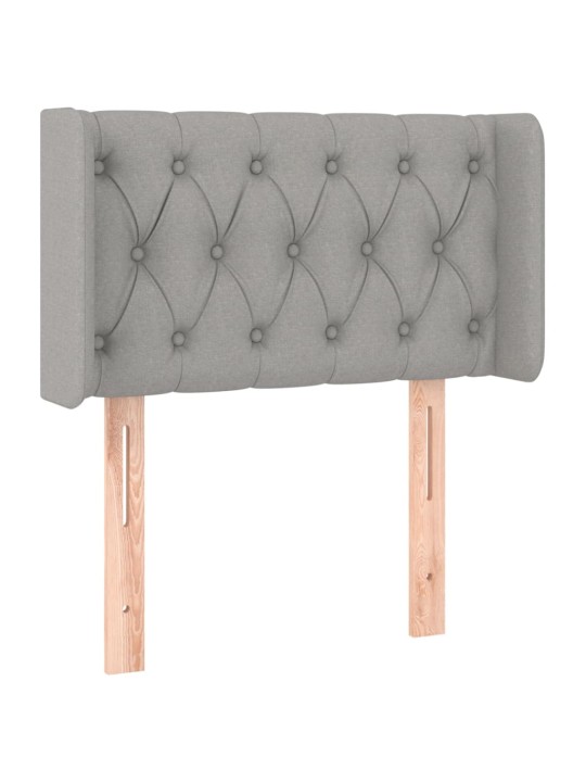 Čelo postele typu ušák světle šedé 83x16x78/88 cm textil