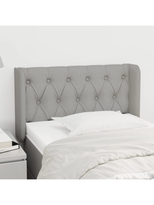 Čelo postele typu ušák světle šedé 83x16x78/88 cm textil