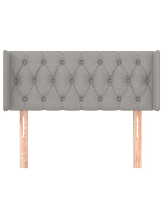 Čelo postele typu ušák světle šedé 103x16x78/88 cm textil