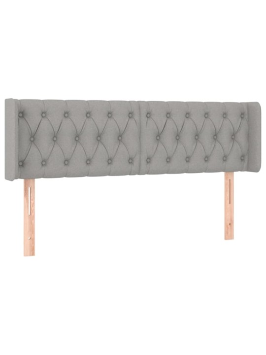 Čelo postele typu ušák světle šedé 163x16x78/88 cm textil