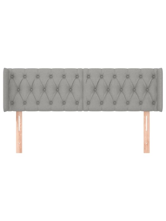 Čelo postele typu ušák světle šedé 163x16x78/88 cm textil