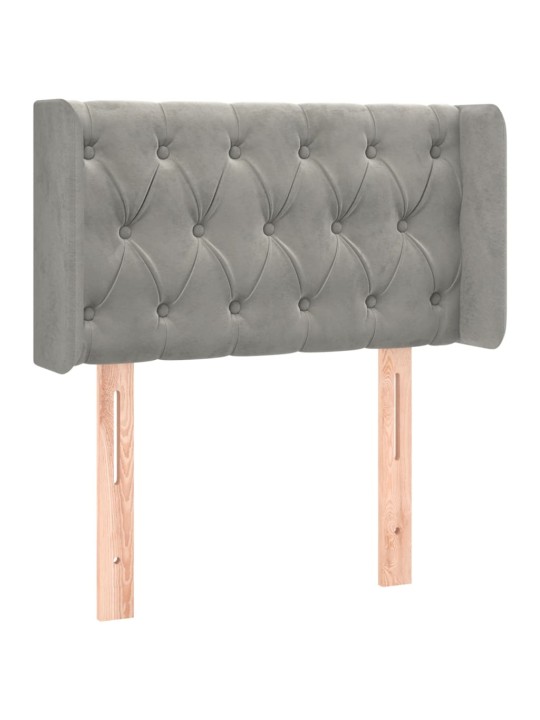 Čelo postele typu ušák světle šedé 83x16x78/88 cm samet