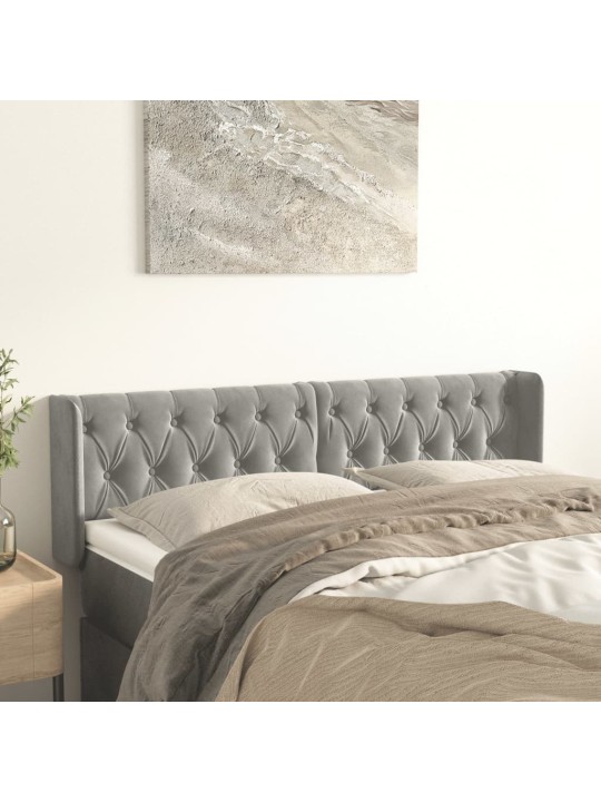 Čelo postele typu ušák světle šedé 147x16x78/88 cm samet