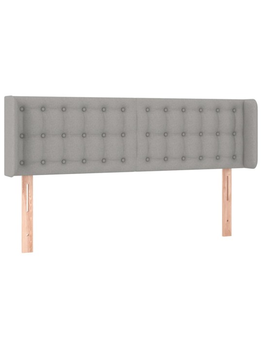 Čelo postele typu ušák světle šedé 147x16x78/88 cm textil