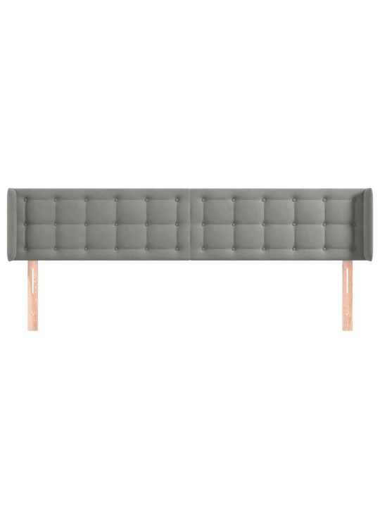 Čelo postele typu ušák světle šedé 163x16x78/88 cm samet