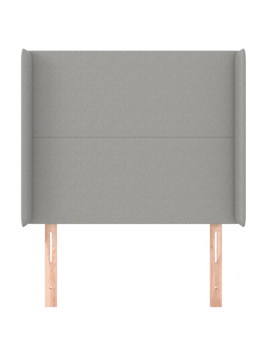 Čelo postele typu ušák světle šedé 83x16x118/128 cm textil