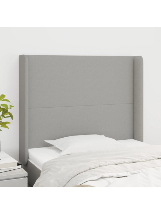 Čelo postele typu ušák světle šedé 93x16x118/128 cm textil