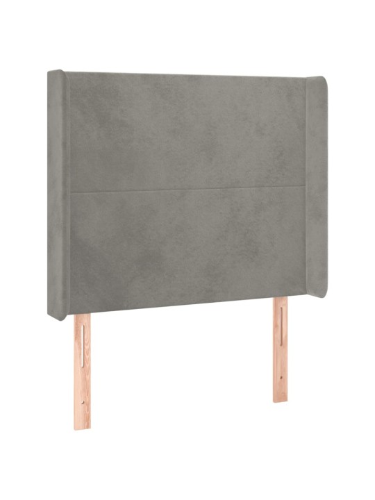 Čelo postele typu ušák světle šedé 103x16x118/128 cm samet