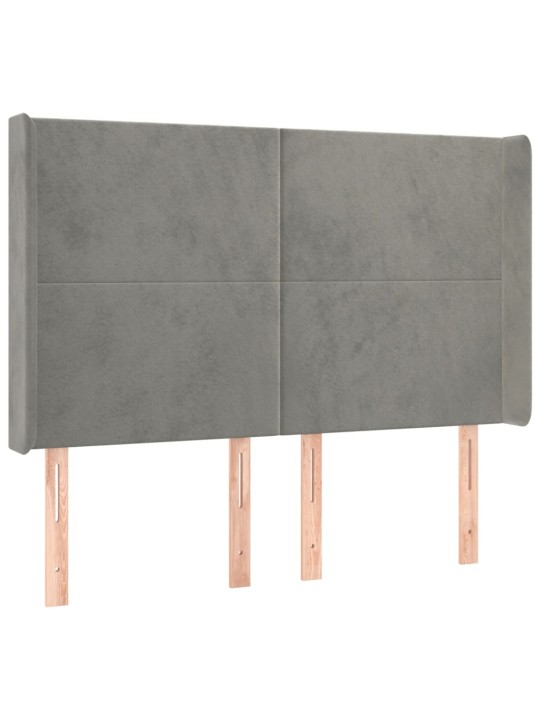 Čelo postele typu ušák světle šedé 147x16x118/128 cm samet