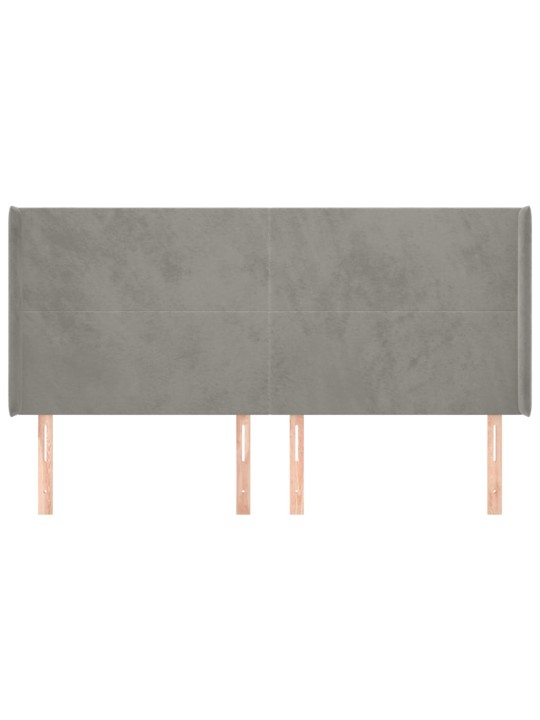 Čelo postele typu ušák světle šedé 183x16x118/128 cm samet