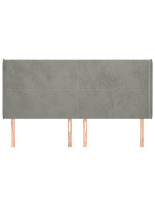 Čelo postele typu ušák světle šedé 203x16x118/128 cm samet