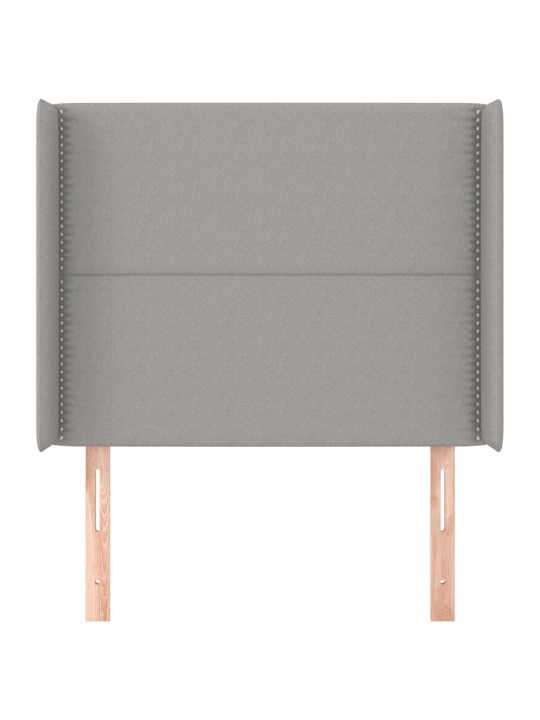 Čelo postele typu ušák světle šedé 83x16x118/128 cm textil