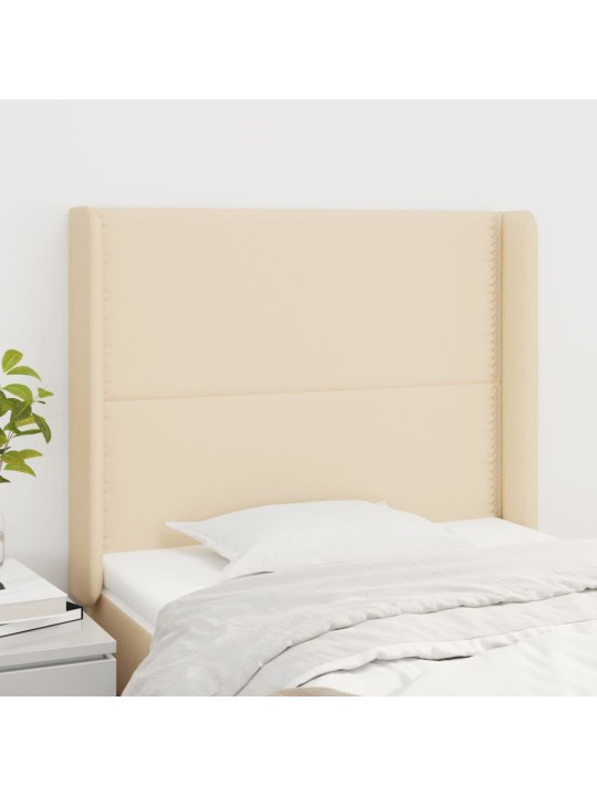 Čelo postele typu ušák krémové 83x16x118/128 cm textil