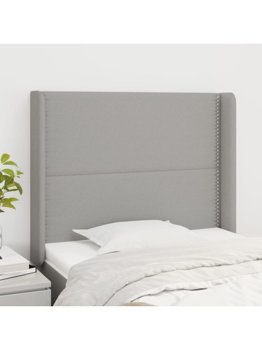 Čelo postele typu ušák světle šedé 93x16x118/128 cm textil