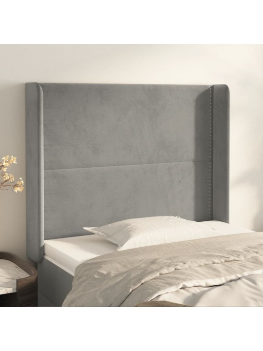 Čelo postele typu ušák světle šedé 83x16x118/128 cm samet