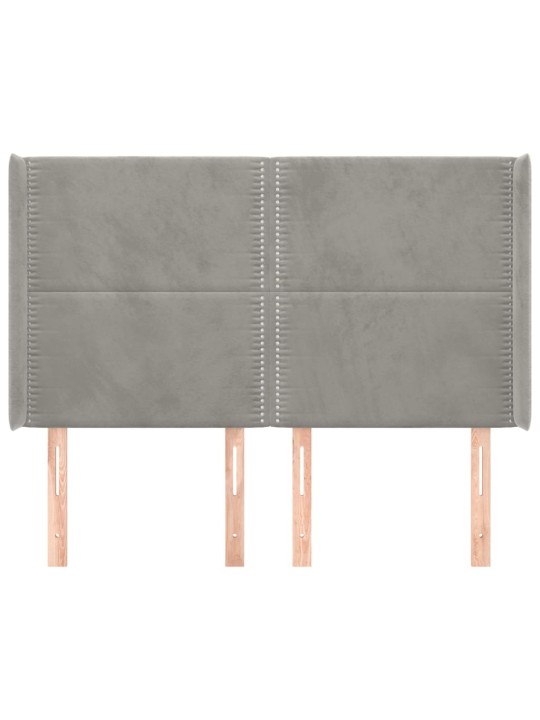Čelo postele typu ušák světle šedé 147x16x118/128 cm samet