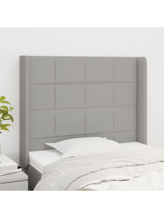 Čelo postele typu ušák světle šedé 83x16x118/128 cm textil