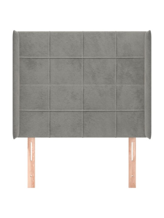 Čelo postele typu ušák světle šedé 83x16x118/128 cm samet