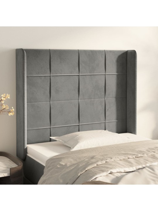 Čelo postele typu ušák světle šedé 83x16x118/128 cm samet
