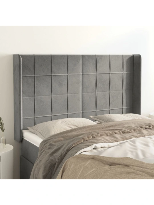 Čelo postele typu ušák světle šedé 147x16x118/128 cm samet