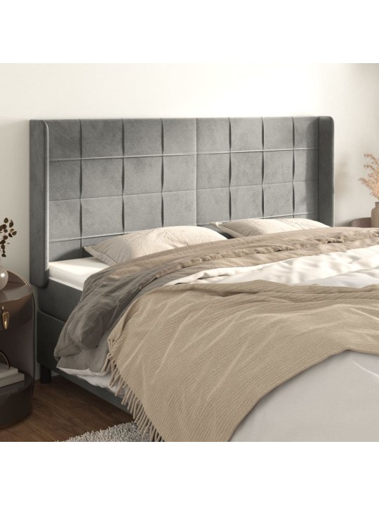 Čelo postele typu ušák světle šedé 203x16x118/128 cm samet