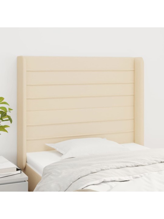 Čelo postele typu ušák krémové 83x16x118/128 cm textil