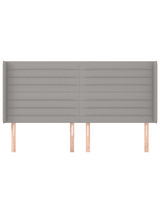 Čelo postele typu ušák světle šedé 163x16x118/128 cm textil