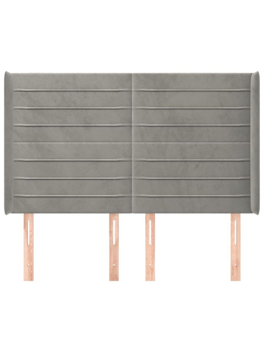 Čelo postele typu ušák světle šedé 147x16x118/128 cm samet