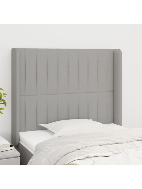 Čelo postele typu ušák světle šedé 83x16x118/128 cm textil