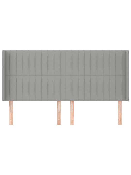 Čelo postele typu ušák světle šedé 183x16x118/128 cm textil