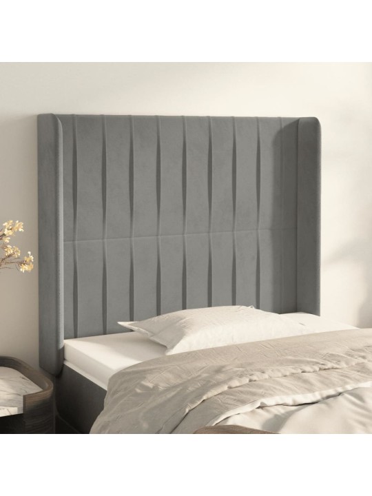 Čelo postele typu ušák světle šedé 83x16x118/128 cm samet