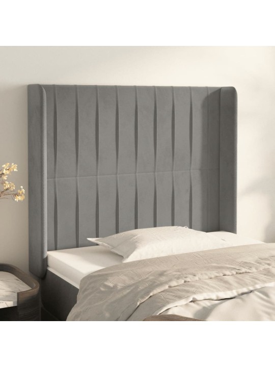Čelo postele typu ušák světle šedé 103x16x118/128 cm samet