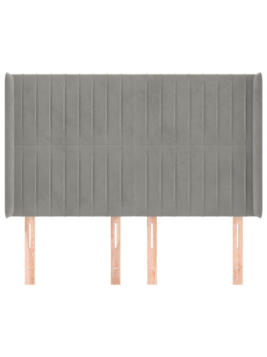 Čelo postele typu ušák světle šedé 147x16x118/128 cm samet