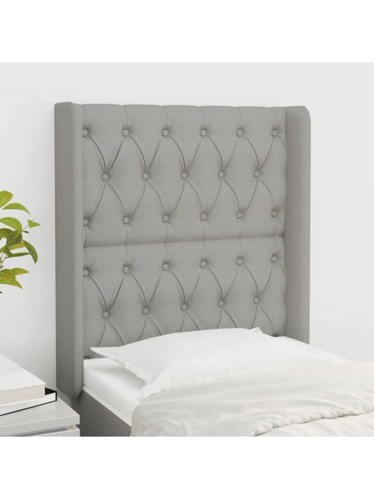 Čelo postele typu ušák světle šedé 83x16x118/128 cm textil