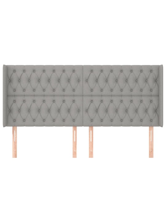 Čelo postele typu ušák světle šedé 183x16x118/128 cm textil