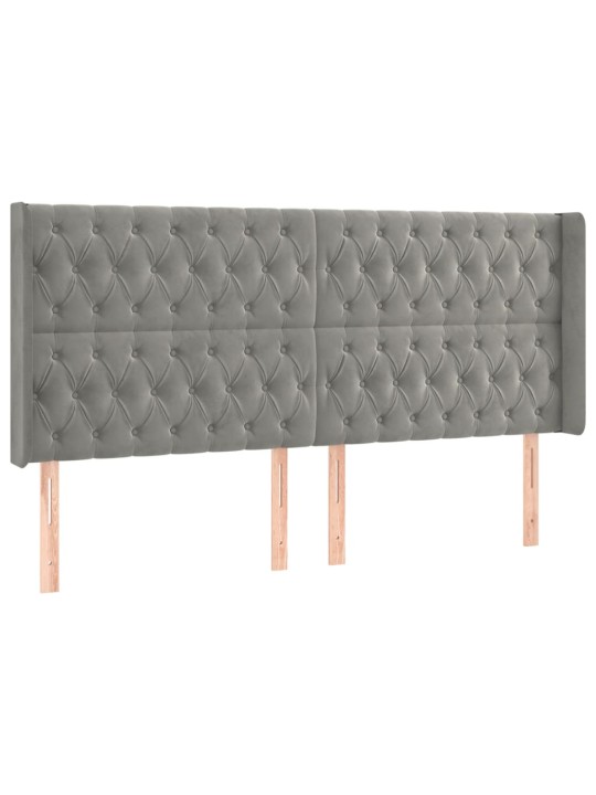 Čelo postele typu ušák světle šedé 183x16x118/128 cm samet