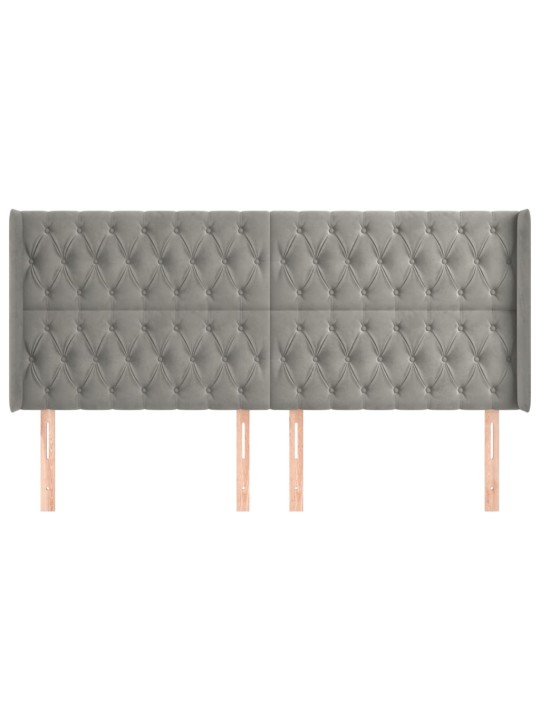Čelo postele typu ušák světle šedé 183x16x118/128 cm samet