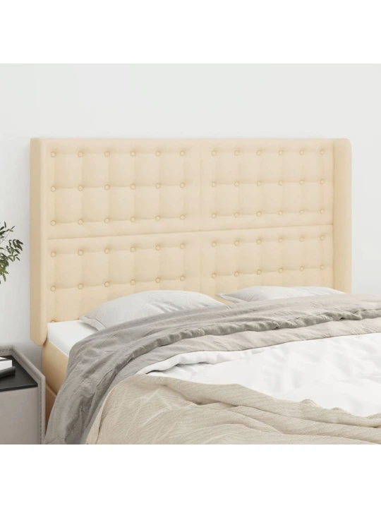 Čelo postele typu ušák krémové 147x16x118/128 cm textil