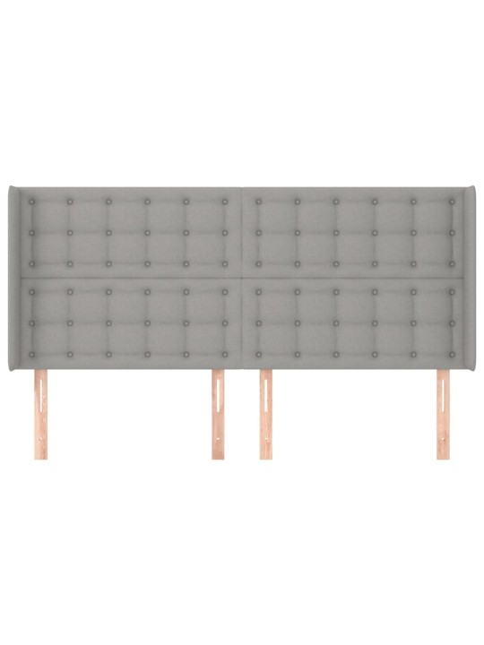 Čelo postele typu ušák světle šedé 183x16x118/128 cm textil