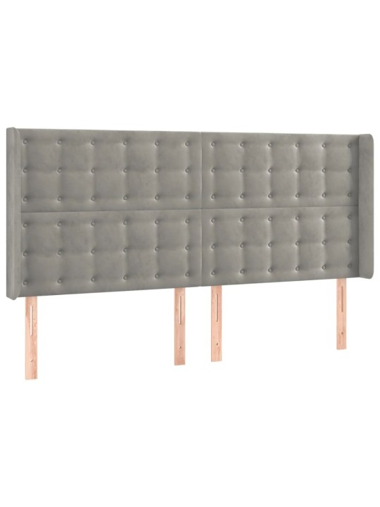 Čelo postele typu ušák světle šedé 163x16x118/128 cm samet
