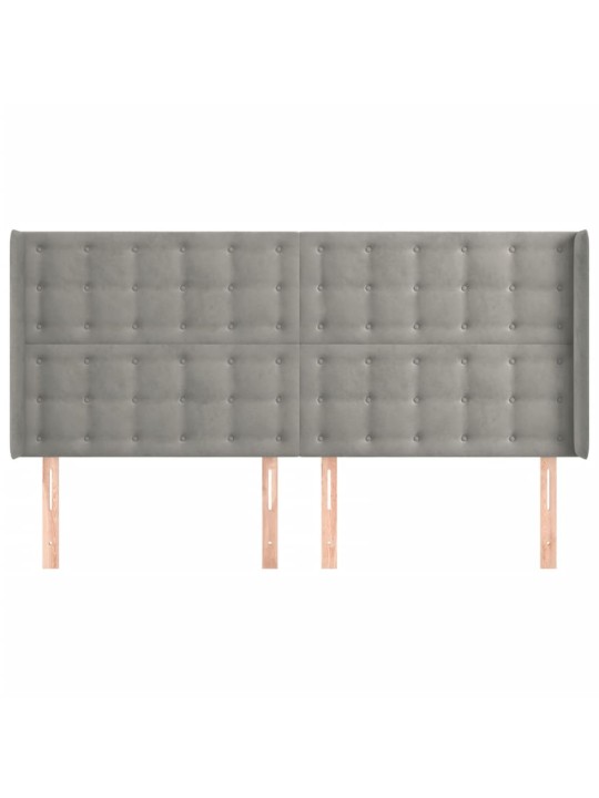 Čelo postele typu ušák světle šedé 163x16x118/128 cm samet