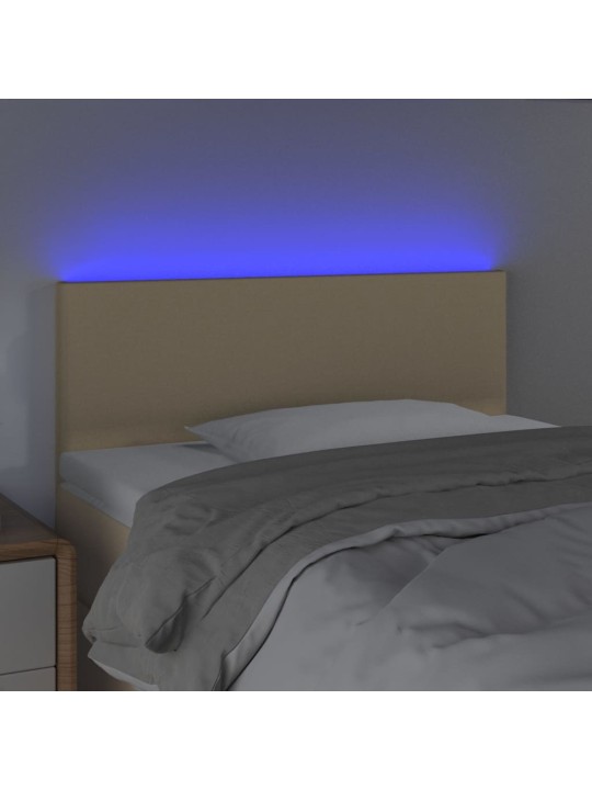 Čelo postele s LED krémové 100x5x78/88 cm textil