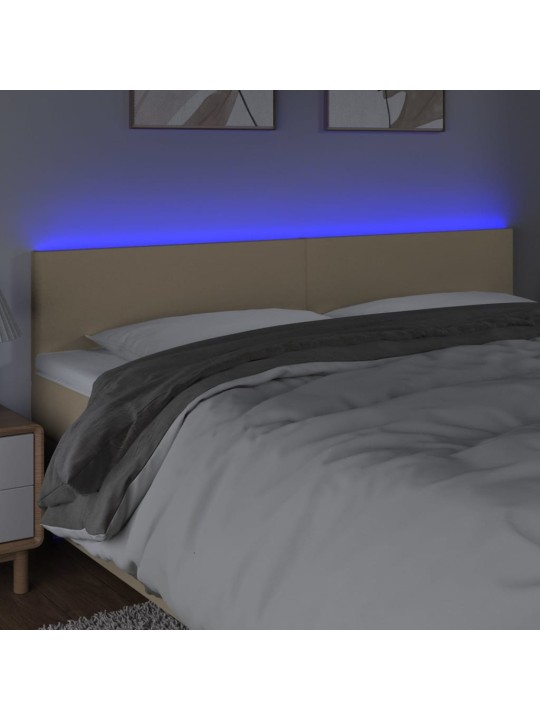 Čelo postele s LED krémové 160x5x78/88 cm textil