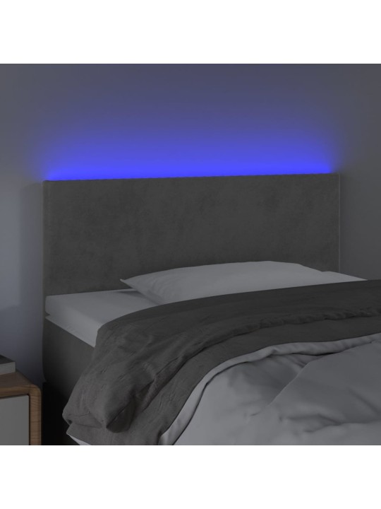 Čelo postele s LED světle šedé 90x5x78/88 cm samet
