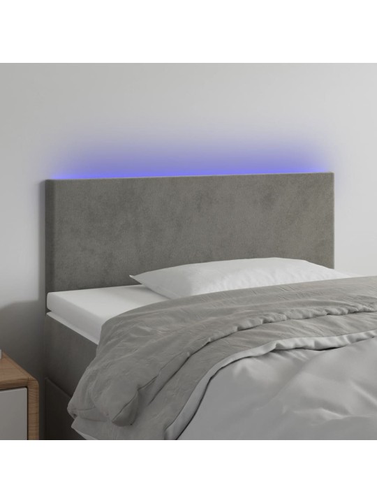 Čelo postele s LED světle šedé 90x5x78/88 cm samet